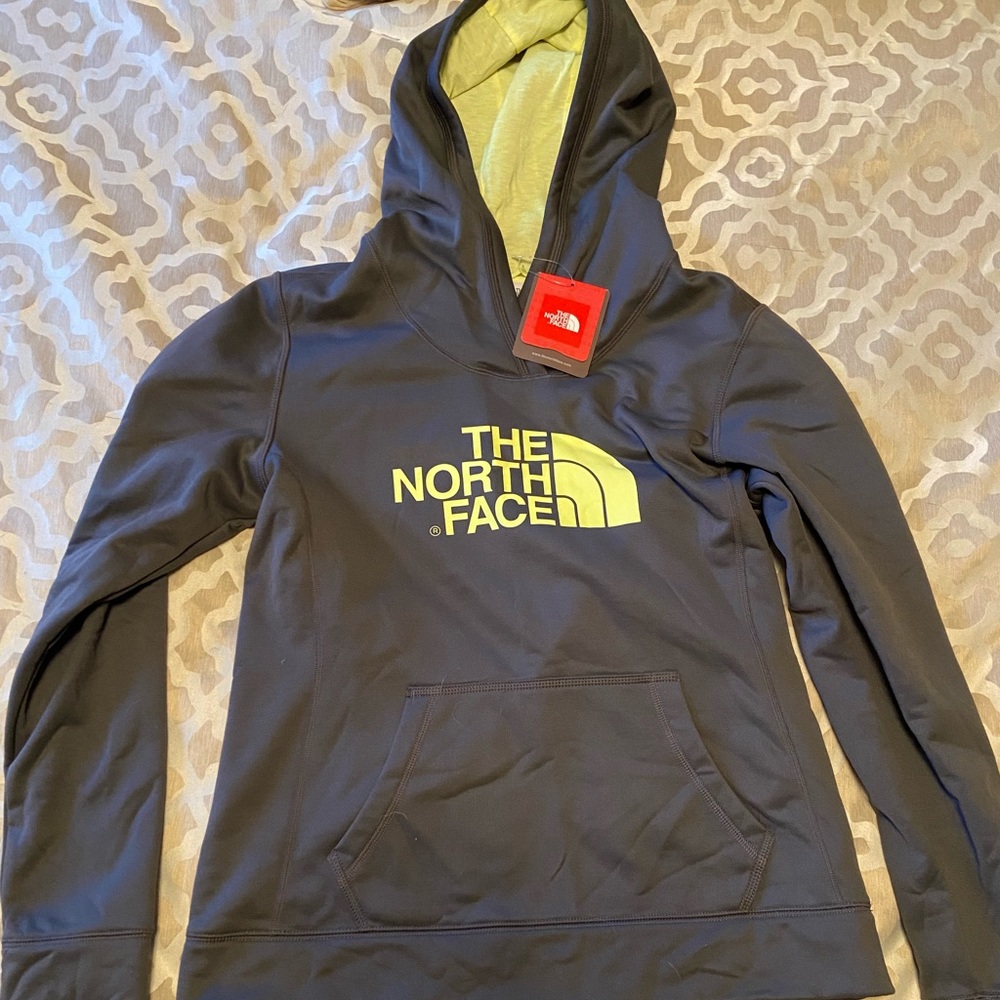 Grey North Face with neon lettering and hood sweatshirt